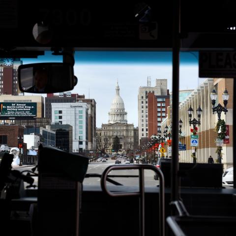 View of the capital building through the windshield of a bus