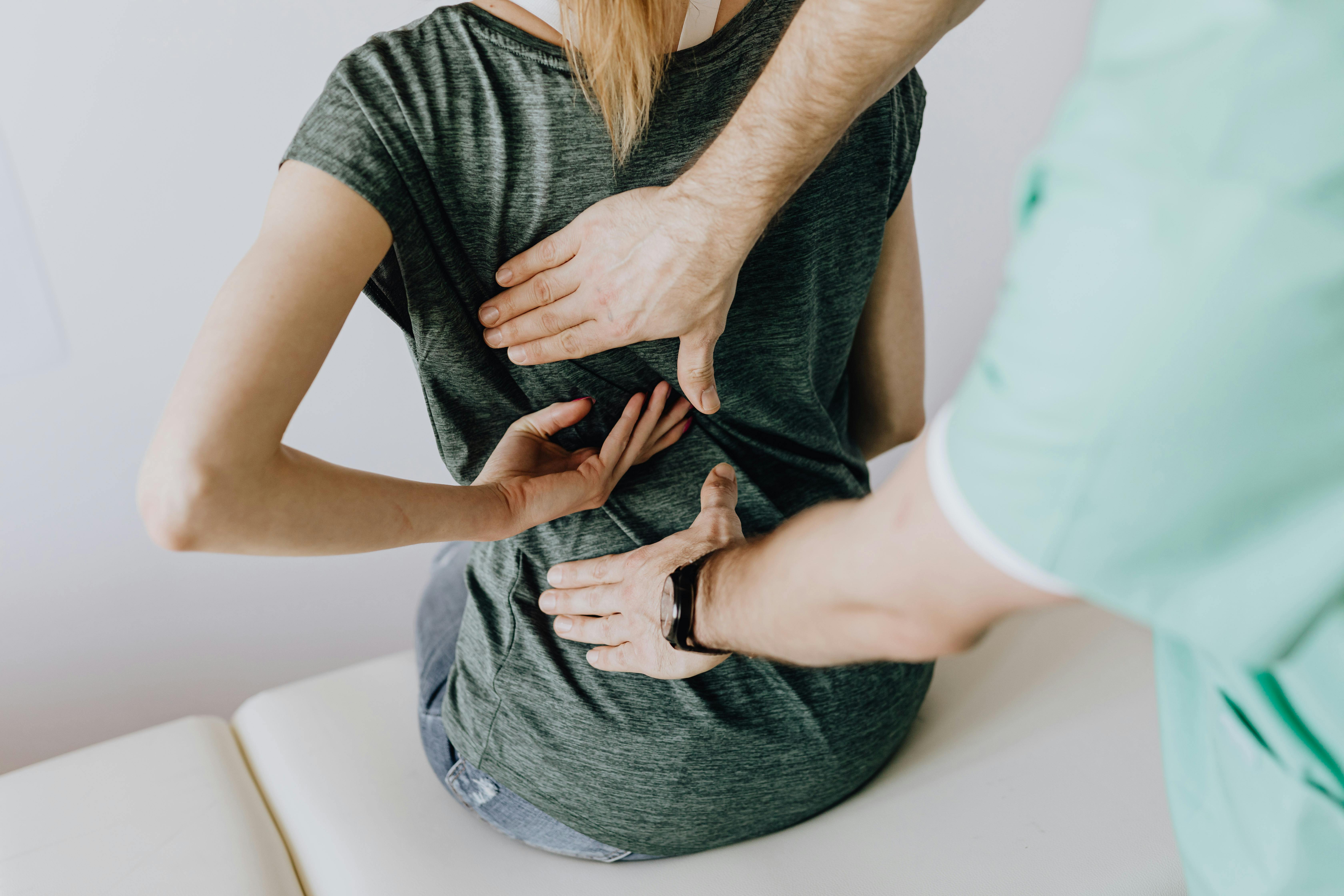 Chiropractor working on patient's back