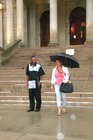 Two people walking towards camera
