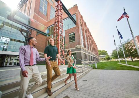 people walking outside of AF Group building