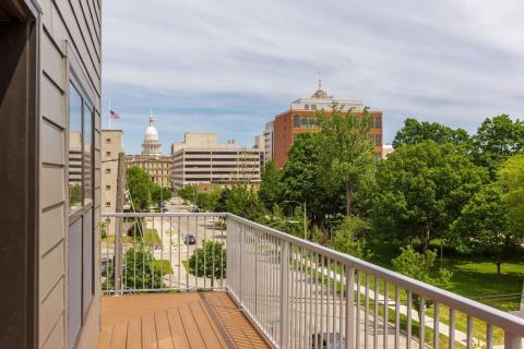 Looking off the balcony of a unit at Metro Place Apartments