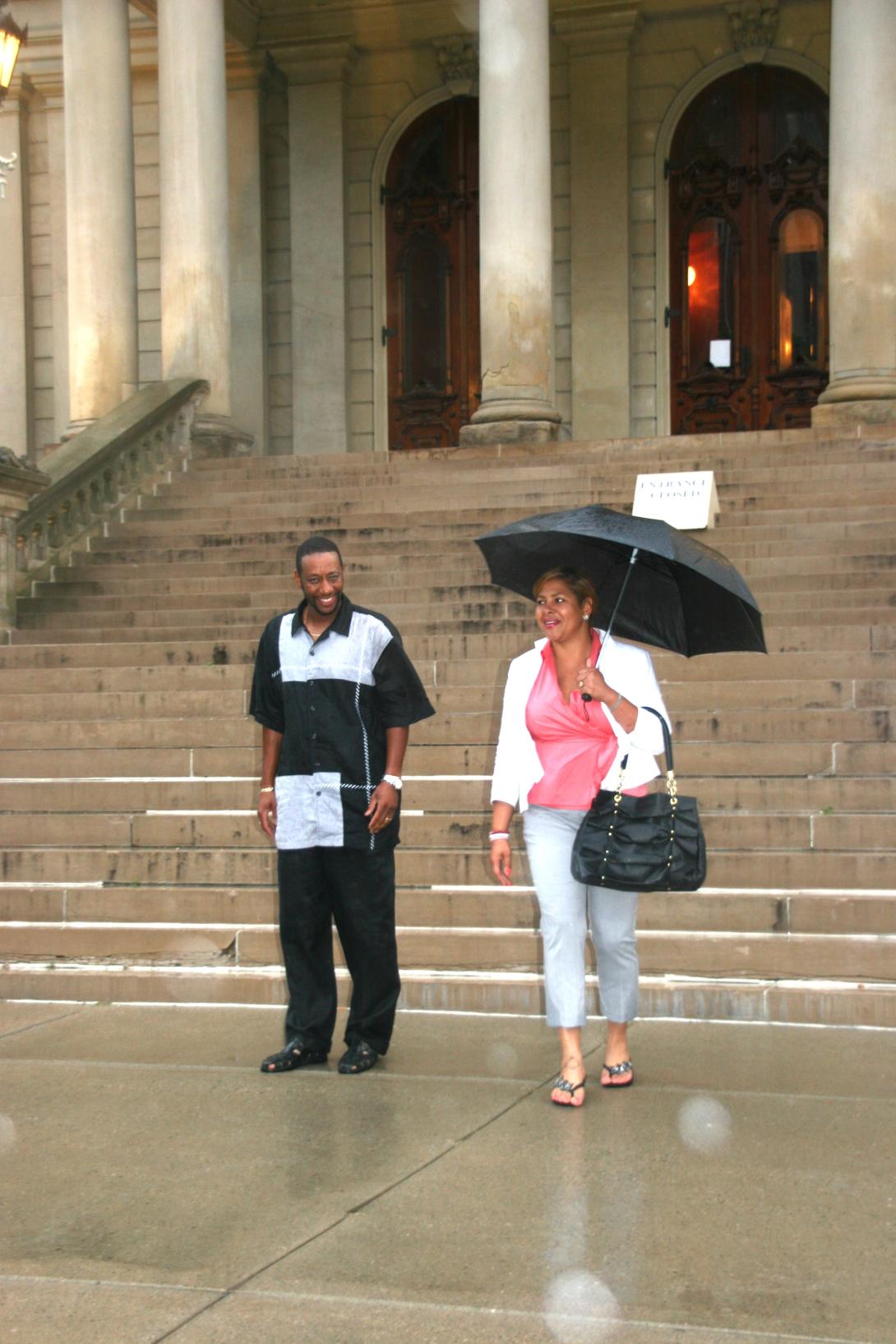 Two people walking towards camera